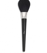 This brush features a supple, fluffy head made of natural, high-quality hair, allowing you to apply powders and powder foundations with the lightest touch possible. Its round shape holds powder and delivers the perfect amount to set makeup naturally, for a sheer, natural look. Made in France. 