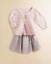 Crafted in plush cotton, this bark beetle textured knit with unique popper front fastening is the perfect layering piece for your little girl.Rolled crewneckThree-quarter length sleeves with rolled cuffsPopper front fasteningCottonHand washImported