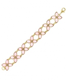 Fit for a princess. 2028's flirty floral design features pink, pear-cut glass accents in gold tone mixed metal. Approximate length: 7-1/4 inches.