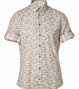 Stylish button down in fine, pale grey cotton - Floral and plaid motifs - Small collar, chest pocket and short, roll-up cuffed sleeves - Rounded hem hangs slightly longer in the back - Modern cut is slim and straight - Elegantly whimsical, ideal for the modern dandy - Pair with jeans, linen trousers, chinos or Bermuda shorts