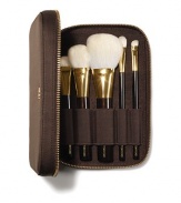 The Tom Ford Brush Set brings ease and luxury to applying your makeup. 5 brushes are meticulously crafted from the finest fibers to perform expertly with Tom Ford color cosmetics. The mahogany-brown, soft-sided portfolio, finished with Tom Ford's signature goldtone zipper, holds the TOM FORD Shade And Illuminate Brush, Bronzer Brush, Cheek Brush, Eye Shadow Contour Brush and Eye Shadow Brush. 