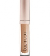 A high-shine, perfectly pigmented lip gloss with rich, long-lasting colour and brilliant shine that creates the appearance of fuller lips. Any skin tone is virtually enhanced by creating a subtle contrast in texture. With the unique blendof moisturizing, anti-aging, anti-oxidant and plumping ingredients provided by the Laura Mercier Lip Complex, the non-sticky gloss formula applies smoothly without feathering or bleeding. 