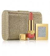 Makeup essentials for Sparkling Nights. The perfect gift: a sleek, goldtone clutch that includes a golden mirror made with SWAROVSKI ELEMENTS and a Pure Color Crystal Lipstick in Bermuda Pink. Limited quantities. Made in USA. 