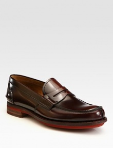 Polished calfskin leather enhanced by a brightly-hued sole.Leather upperLeather liningLeather soleMade in Italy