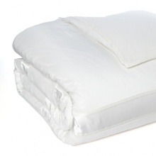 Effortless elegance. A resplendent border in a crisp white distinguishes this luxurious Donna Karan sham.