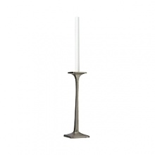 Organically molded under fire, this handmade candlestick exudes metal artistry with a New York edge.