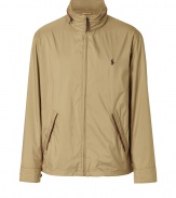 Sporty windbreaker in fine, tan synthetic fiber - A stylish spin on a modern classic from Ralph Lauren - Durable, lightweight material - Small, stand-up collar with zipper embellishment - Long, snap cuff sleeves, slash pockets and full zipper closure - Embroidered polo pony at chest - Slimmer, straight cut - Casually cool and ultra versatile, great for everyday - Pair with jeans, chinos or dressier trousers