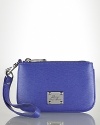 Carry your essentials in style with this textured leather wristlet from Lauren Ralph Lauren.