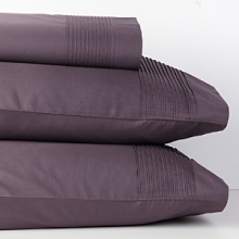 Lustrous and luxurious, the Modern Classics collection brings sophisticated style to any bed, with flexible pieces that complement one another. Pillowcases crafted from long-staple cotton sateen and detailed with elegant tuxedo pleats.