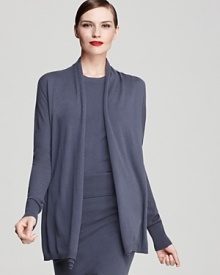 Finish your look in lightweight luxury with this Donna Karan New York draped cashmere cardigan. Belt it for a more sculpted silhouette, or play up the proportion and layer it open over longer foundation pieces.