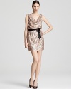 Aqua perfects eye-catching party style with this sparkling frock, finished with a contrast ribbon belt for chic polish.