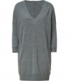 The tried-and-true sweater dress gets a trend-right modern makeover with this oversized version from Faith Connexion - Deep V-neck, three-quarter sleeves, sloped shoulders with exposed seams, continuous side seam details with pockets, oversized fit, wide ribbed hem - Pair with textured tights, a fringed scarf, and ankle boots