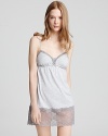 Enjoy the height of romance with this lace-trimmed nighty with bow detail.