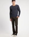 Sporty pinstripes lend color and character to a soft layering essential. Henley placket Cotton Machine wash Imported 