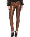 Steal the show in these metallic jeggings from Calvin Klein Jeans. With denim styling, they're a chic update to skinny jeans in blue or black!