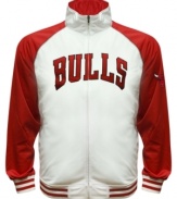 The Most Valuable Fan wears this baseball style running jacket featuring the Chicago Bulls by Majestic.