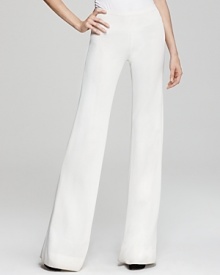 The epitome of understated elegance and ease, these Donna Karan New York pull-on pants are fashioned with a chic wide leg in a clean, crisp silhouette that works well with just about anything.