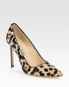 An animalistic point toe silhouette with leopard-printed pony hair and smooth leather trim. Stacked heel, 4 (100mm)Leopard print pony hair upperPoint toeLeather lining and solePadded insoleMade in Italy