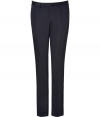 Elegant pant in fine, pure dark blue wool - Lighter weight fabric drapes beautifully - Slim, classic straight cut - Crease detail from hip to hem flatters and lengthens the leg - tab waist with belt loops - Pockets at sides, welt pockets at rear - Sleek and versatile, ideal for both work and play - Pair with a button down and blazer, or go for a more casual look with a t-shirt and cashmere pullover