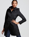 Keep your rainy day looks simply modern with this sleek lightweight coat from DKNY.