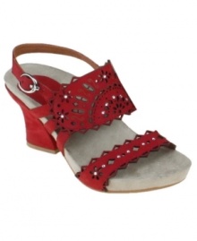 Western wear for the modern girl. The Rosarito sandals by Earthies are a funky touch of fashion with their laser-cut suede straps, trimmed with sparkling rhinestones.