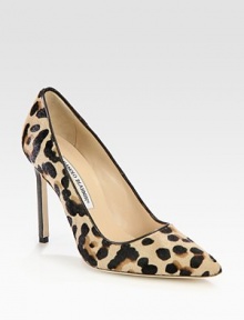 An animalistic point toe silhouette with leopard-printed pony hair and smooth leather trim. Stacked heel, 4 (100mm)Leopard print pony hair upperPoint toeLeather lining and solePadded insoleMade in Italy