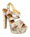 Pretty and femme. Jessica Simpson's Poll platform sandals feature an all-over floral print that will make you feel so amazingly beautiful.