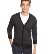 A modern revision of the classic staple. Calvin Klein's pinstripe cardigan is not your typical grandpa sweater.