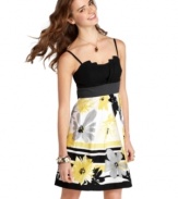 A floral skirt and polkadot sash come together gracefully on a dress from BCX that's made of flirty parts!