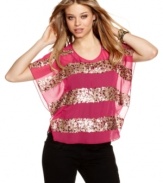 Infinite paillettes come together to create the most dazzling stripes of all on Rampage's rendition of the perfect party girl top!