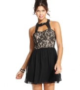 A strong look for a tough chick! Trixxi's party dress features a fierce lace bodice and faux-leather trim.