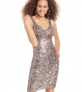 Sequins and pailettes of varying sizes sparkle atop City Studio's sleek tank dress!