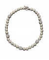 A couture collar necklace, by Lauren by Ralph Lauren. Elegant glass pearl (10 mm) is accented by crystal-encrusted nuggets of silvertone mixed metal. Approximate length: 18 inches.