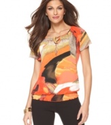 A bright painterly print adds a bold splash of color to this Alfani top -- perfect over denim or trousers!