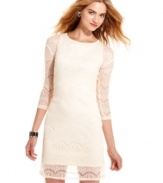 There's something absolutely magnetic about this three-quarter sleeve dress from Planet Gold. Maybe it's the gorgeous lace overlay, or the classic sheath fit that we adore.