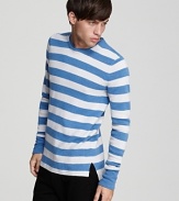 Oozing old world charm, this wide-stripe sweater takes the classic look up a notch with solid elbow patches, a double-layered crew neck and vented drop tail hem.