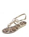 Luxe jewels rest atop snakeskin embossed leather on these Sam Edelman sandals, a glam style with laid-back practicality.