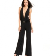 Take the plunge. Baby Phat's sultry, wide-leg jumpsuit features a deep v-neckline for bold, night-out style.