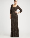 Glamorous allover sequins and beads add sparkle to this stunning floor-length style.Scoopneck Three-quarter sleeves Low scooped back Concealed back zip Fully lined About 45 from natural waist Nylon Spot clean Imported