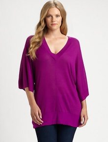 Offering a relaxed fit, a feminine sweater with a deep-v neckline. Three-quarter sleeves provide arm coverage.V-necklineThree-quarter sleevesPull-on styleBanded hemAbout 32 from shoulder to hemViscose/rayon/polyesterDry cleanImported