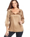 Indulge in the casual elegance of Jones New York Signature's plus size peasant top.