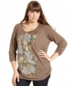 Snag a standout casual look with Style&co.'s three-quarter-sleeve plus size top, showcasing an embellished print.