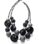 Round up the usual suspects with this chic statement necklace from Stye&co. The circular plastic beads make this accessory your go-to finishing piece. Crafted in hematite tone mixed metal. Approximate length: 19 inches + 2-inch extender.