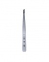 Keep brows groomed with this deluxe tweezer, crafted by Rubis of Switzerland. In stainless steel, this slant-tip instrument is considered the finest on the market. Comes with a rubber cap to protect the precision tip. 