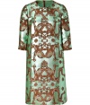 Glamorous evening looks get a shock of vintage elegance in Issas shimmering pistachio green dragon print shift dress - Rounded neckline, 3/4 sleeves, hidden back zip with slit and hook closure at nape - Straight silhouette, mini-length - Team with shimmering flats and a dusting of gold jewelry