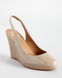 Elie Tahari's glossy Alexia wedges showcase a classic slingback silhouette and timeless style.