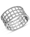 Fierce fashion from GUESS. This hinged cuff bracelet features a checkered design embellished with crystal accents. Crafted from imitation rhodium tone mixed metal. Approximate diameter: 2-1/2 inches.