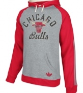 Keep warm as you cheer and rant for the Chicago Bulls in this pullover hoodie by adidas.