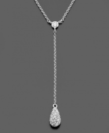 A luminous single teardrop of clear crystals makes a romantic statement on this fine necklace. In silvertone rhodium plated mixed metal. Chain measures approximately 16 inches; drop measures approximately 2 inches.