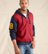 Throwback. Sport a scholastic style in this comfortable zip-up hoodie from Tommy Hilfiger.